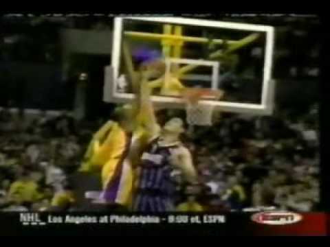 Kobe Bryant dunks on Yao Ming