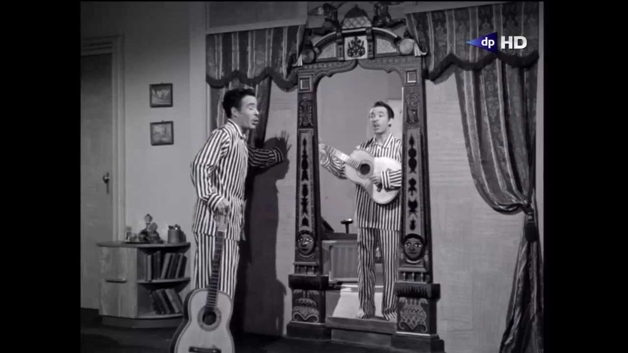 A man makes a kiss face to a maid