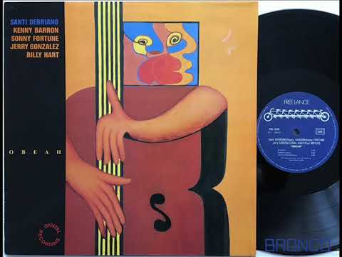 SANTI DEBRIANO * TIME IS OF THE ESSENCE