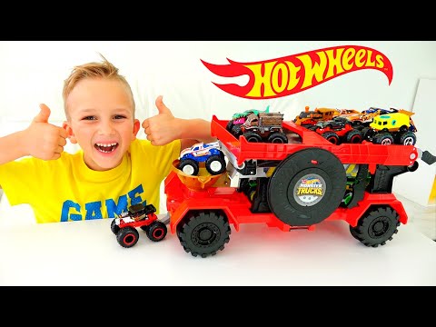 Vlad i Nikita bawią się z Hot Wheels Monster Trucks