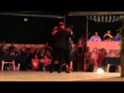  Angelo Grasso  and  Carina Morrudo  are  dancing  to  "  Fueron Tres Años  "  by  Héctor Varela  at  Catania Tango Festival  in  2010