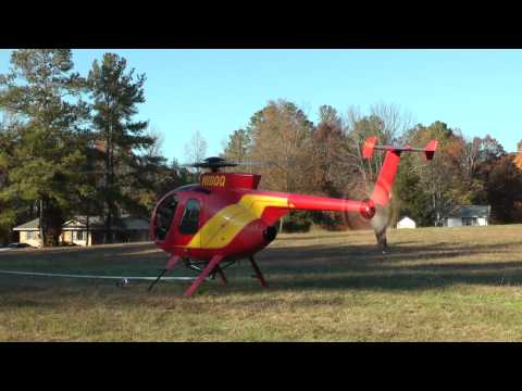 Aerial Solutions Inc. Helicopter Trimming Trees around Power Lines
