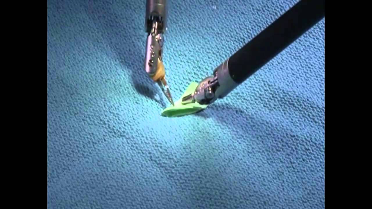 Amazing Robot Surgeon Folds Teeny Tiny Paper Aeroplane