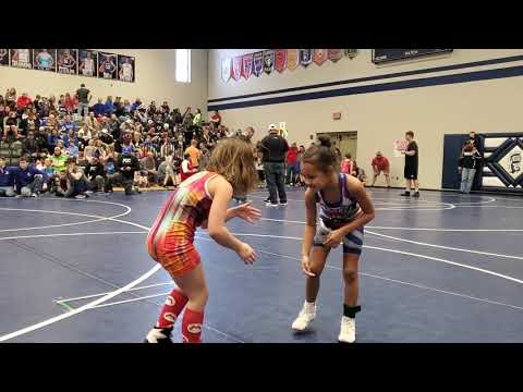 Girls wrestling Lyla gets pin 1st round