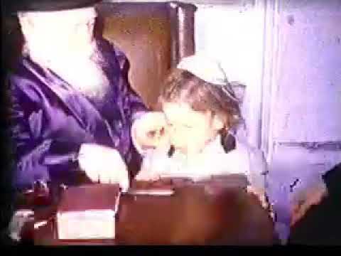 The Kapishnitzer Rebbe with a Upsherin boy