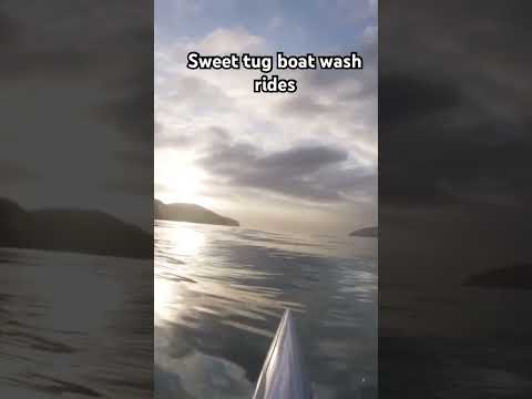 Surf ski on a tug boat wash