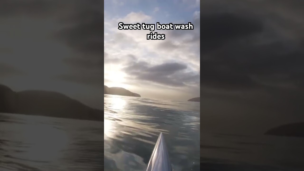 Surf ski on a tug boat wash