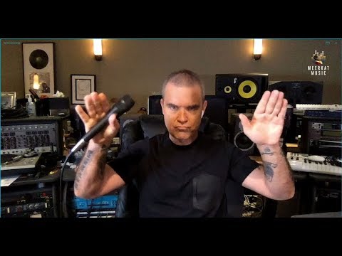 ✅  Robbie Williams conceals thinning locks with powder after failed hair transplant