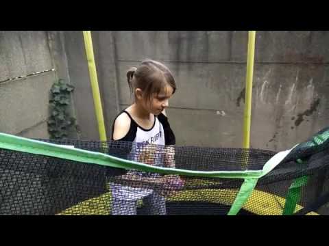 Daughter peeing while standing up with waterballoon