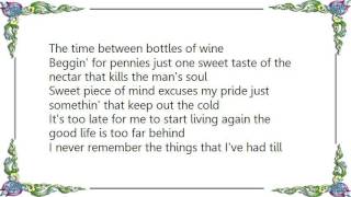 Waylon Jennings - Time Between Bottles of Wine Lyrics