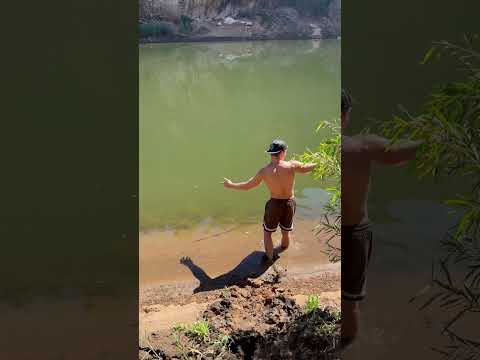 Swimming In A Crocodile Infested River!#shorts