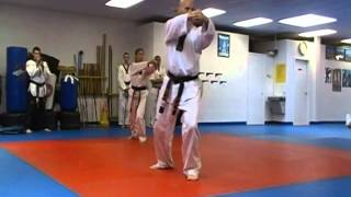 Jodie and Greg Poomse forms for second dan testing at Park's Taekwondo Erie Pa