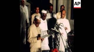 SYND 29 3 77 ACTING PRESIDENT JATTI ADMINISTERS OATH TO NEW CABINET video