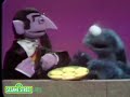 Sesame Street Cookie Monster With Argues Count Von Count