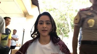 Young lady getting pixie haircut