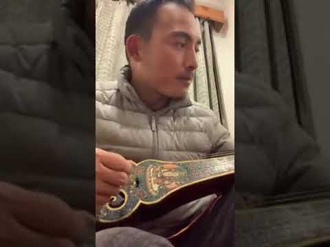 Mr. Tshewang Rinzin practicing song named Namkhai Yu Gi Phodrang.