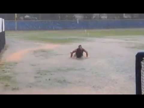 Mike Richards gets wet during a rainout