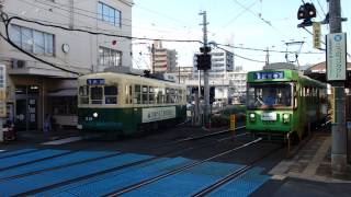 preview picture of video '長崎電気軌道201形 浦上車庫出庫（1300形と併走）'