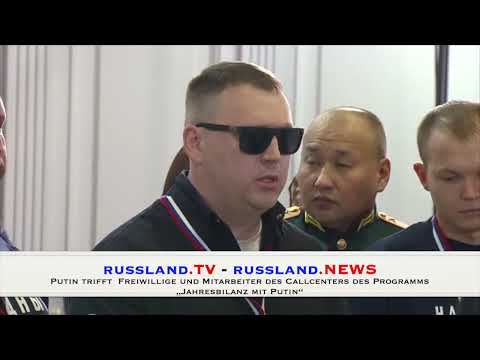 Putin trifft  Freiwillige und Mitarbeiter des Callcenters des Programms „Jahresbilanz mit Putin“