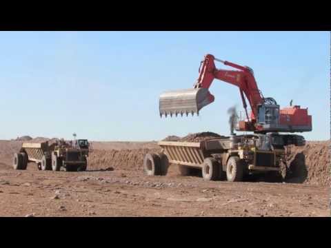 CAT 773B & HITACHI EX1200 Working 3