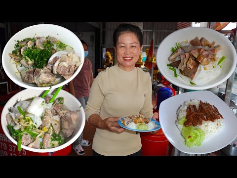 Yummy noodle soup, rice with fried chicken or pork, Cambodian street food