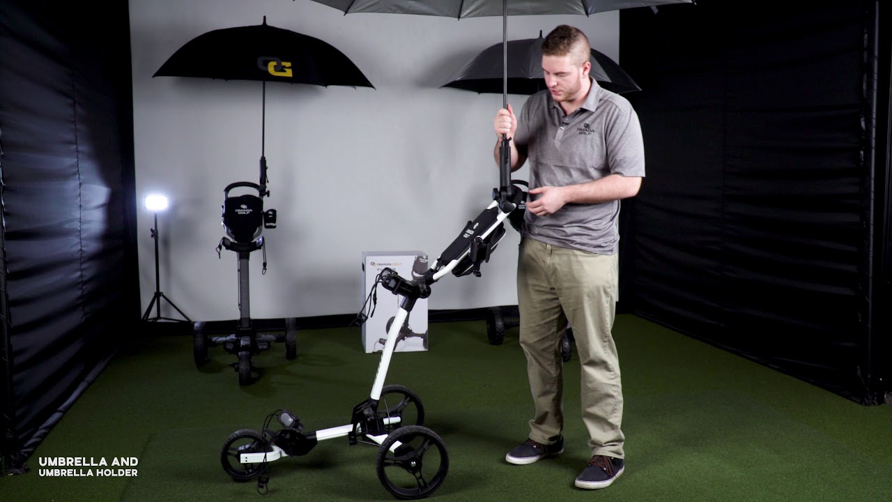 Watch video Trilite Golf Push Cart Breakdown | OG Umbrella & Fitted Umbrella Holder Now Trilite Golf Push Cart Breakdown | OG Umbrella & Fitted Umbrella Holder