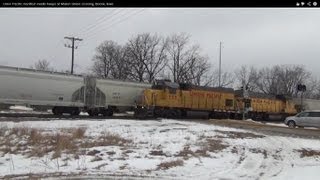 preview picture of video 'Union Pacific manifest meets Geeps at Marion Street crossing, Boone, Iowa'