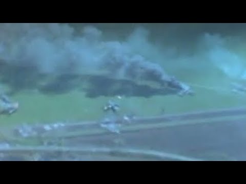 P-47 Thunderbolts strafing a German airfield - color gun camera footage
