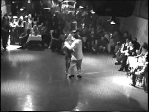  Claudia Jakobsen  and  Mariano Frumboli  are  dancing  to  the  tango  "  Zum  "  by  Color Tango  in  1998