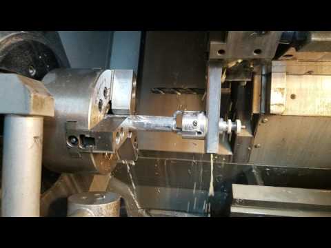 Haas ST10 parts catcher with flow controls