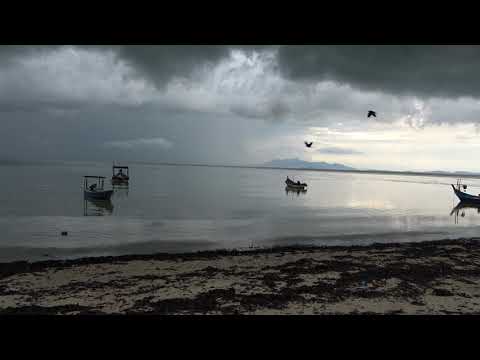 Walking along the Tangung Bungah beach with guide Irwan ~ Mahalo_JC