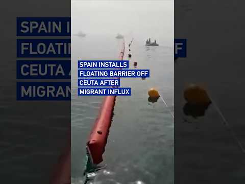 Spain installs floating barrier off Ceuta after migrant influx #worldnow