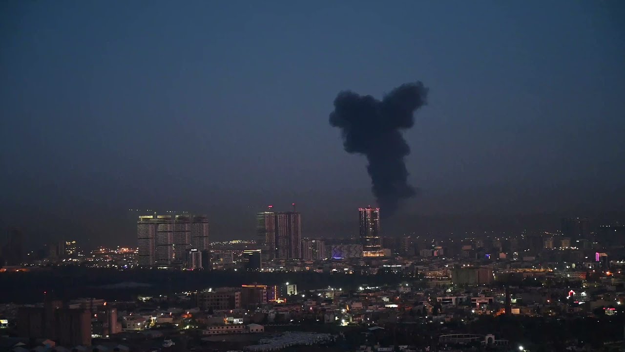 Video | Thick black smoke rising from Iraq airport area hosting US-led troops | AFP
