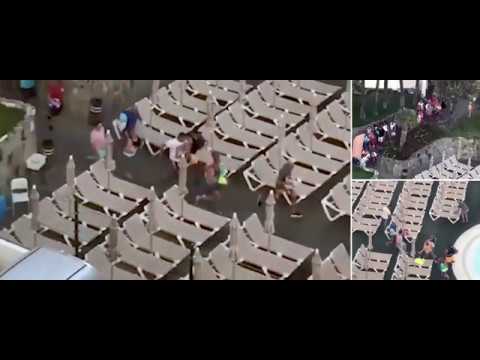 Ready, steady, GO! British holidaymakers in desperate 8am sunbed stampede as they race to beat the G