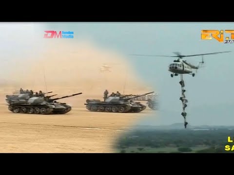 ERi-TV: Celebration of Silver Jubilee Anniversary of Sawa-Military Parade Featuring Tanks & Hcopters