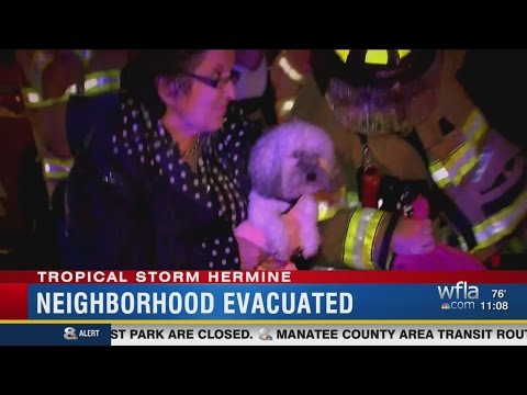 Sarasota residents evacuate because of flooding