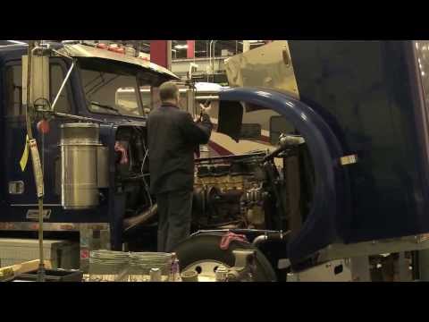 Chris Fisher and the OCEARCH team receive a tour of Milton CAT's Milford Facility