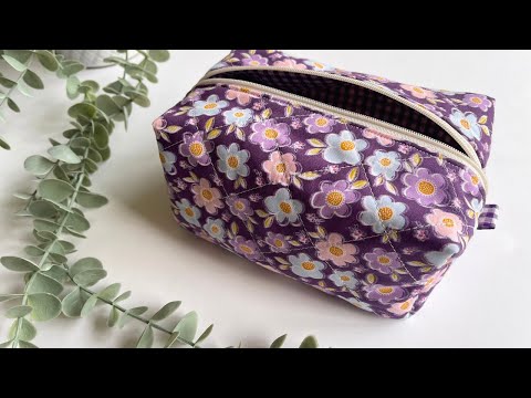 How to sew a boxed zip pouch with no raw edges inside & insert a zip. Easy sewing project.