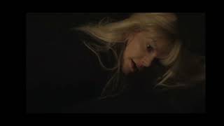Blonde criminal handcuffed behind back