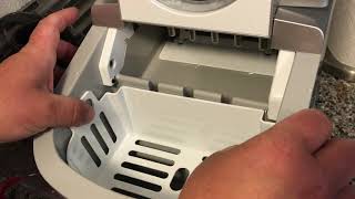 How to use Frigidaire ice maker and remove drain plug for cleaning.