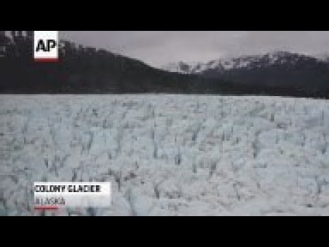 Searchers are scouring a remote Alaska glacier for the remains of passengers who died in 1952 when a