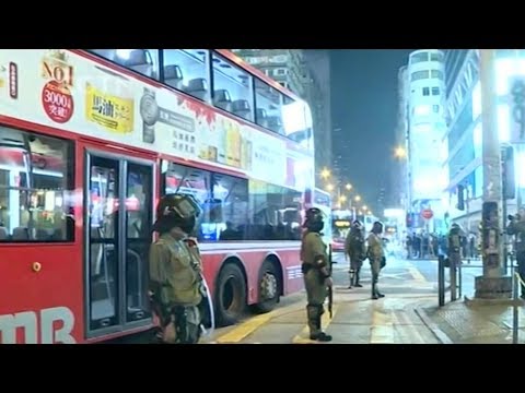 Three arrested for vandalizing public buses in HK