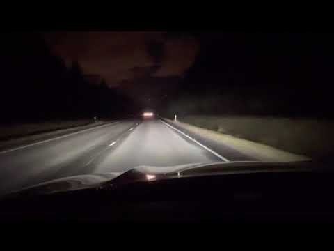 BMW X5 45e Adaptive LED headlights on dry road