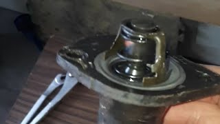 3.3 litre dodge caravan thermostat location/install