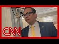 CNN reporter presses George Santos on his 'web of lies'