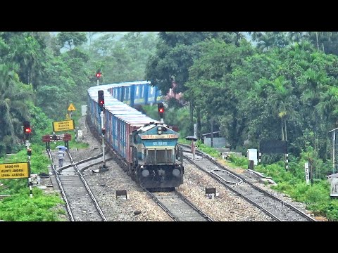 SGUJ/12160/WDG-4 Diesel Locomotive with Container Freight Train Passing Nagrakata Railway Station