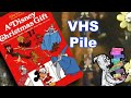 VHS Pile A Disney Christmas Gift