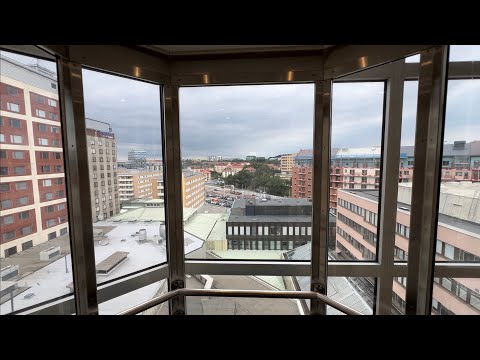 1986 KONE (mod.) Traction Scenic Elevators @ Solna Torg 13, Solna, Sweden.