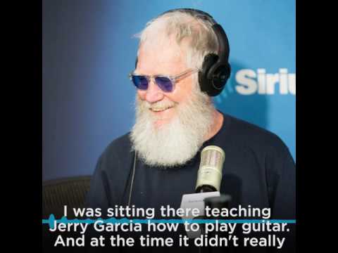 David Letterman shows Jerry Garcia how to play guitar