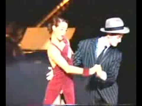  Gustavo Russo  and  Alejandra Mantinan  are  dancing  to  the  milonga  "  La Luciernaga  "  by  Color Tango